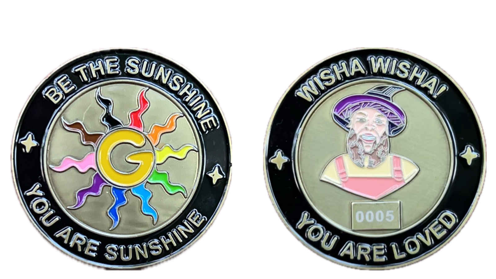 Both faces of the Gilly the Sunshine Wizard challenge coin side by side: the B Side rainbow sun with a gold G, and the A Side portrait of Gilly in a purple wizard hat.